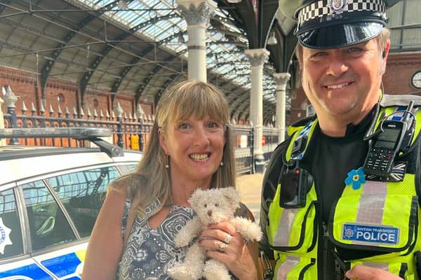 Linda Lawson with PC Rob Simpson. Linda was re-united with a teddy bear who was a present to her from her late husband, after police arrested a man who had taken her suitcase when he arrived in Sheffield Station