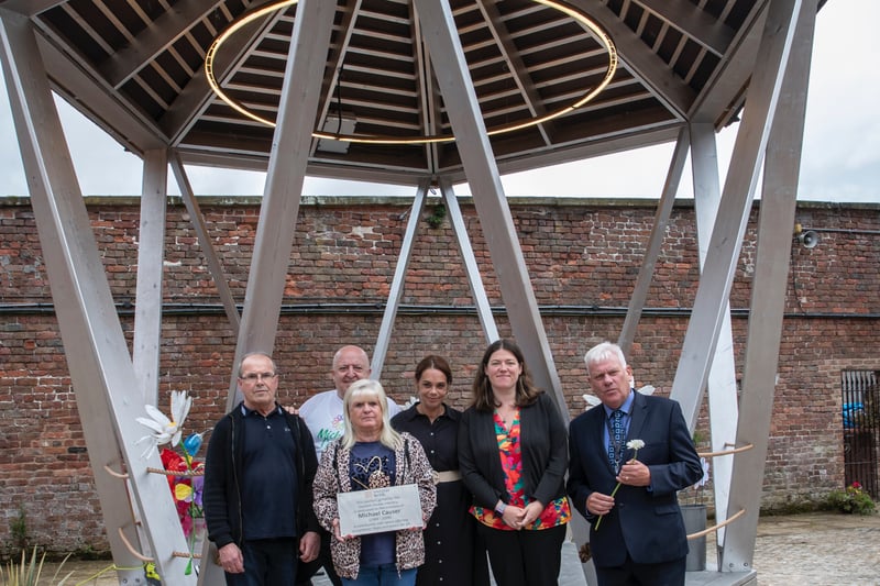 Mike and Marie Causer,  Steve Mcfarlane, Racheal Jones, Emily Spurrell and Cllr Graham Morgan at the pavilion dedicated to Michael.