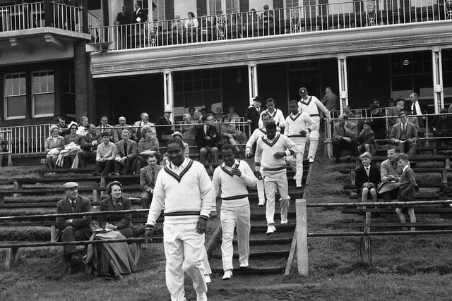 Frank Worrell leads the West Indies on to the field at Ashbrooke at the start of the second and final day of their match with the Minor Counties.