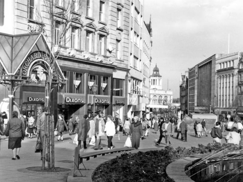 Dixons on Fargate, beside the entrance to  Orchard Square shopping centre, with the Goodwin Fountain in the foreground, in Febryary 1989. Photo: Picture Sheffield