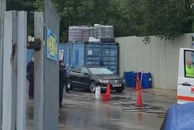Police made safeguarding visits to eight Sheffield car washes and made six arrests on Wednesday (August 3) as part of a crackdown on modern slavery and human trafficking. Image taken from video distributed by SYP.