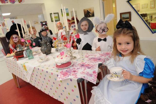 Pupils from Northern Saints Primary School dressed as characters from Alice in Wonderland in 2015.