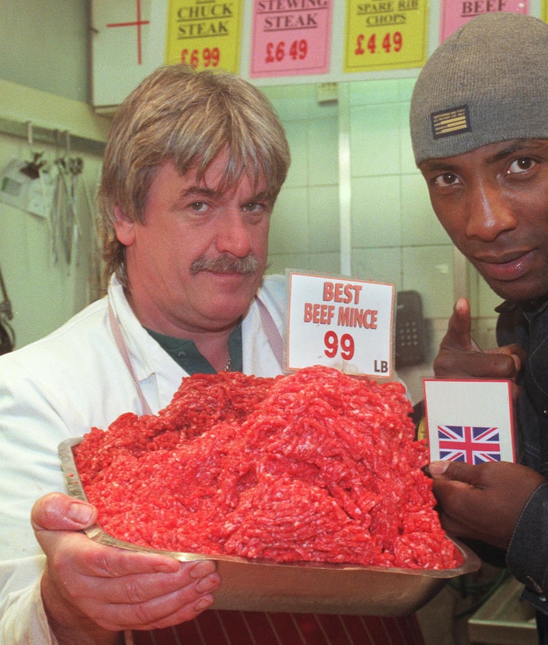 Butcher John Naylor at Castle Market, Sheffield, with boxer Johnny Nelson, who said he was going to make 'mincemeat' of his latest opponent