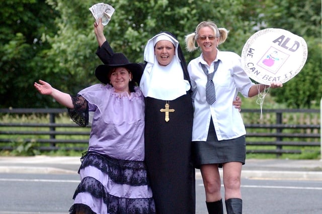 Who can tell us more about this 2003 fancy dress charity night - and who are the people pictured having a great time?