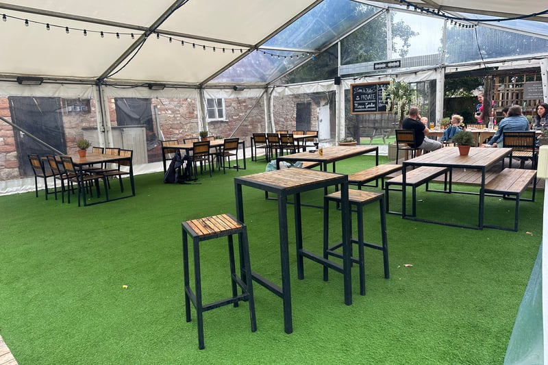 The Bear & Swan has a newly-decked back garden with tables and chairs on artificial grass under covering (certainly a good thing on a wet day). There is also a small outside bar area.