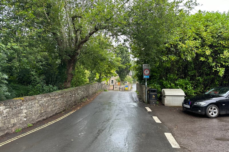 The village is navigated via narrow roads taking you over hump-back bridges and past charming cottages. On the right (just out of picture) is the village hall and ahead is a bridge over the River Chew. Turn right over the bridge to join The Batch.