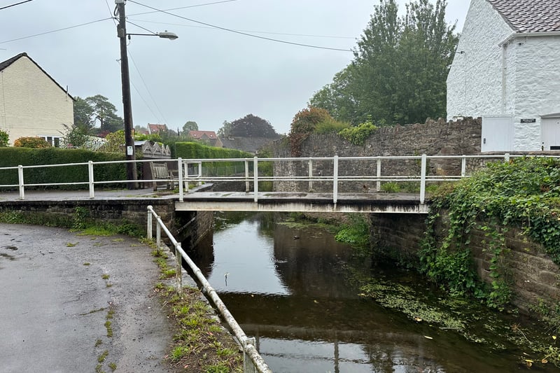 At the end of The Batch, as the road turns left, a footbridge over the River Chew can be seen on the right. It takes people to the Queen’s Arms pub in village, or onto the church. It’s a great spot for playing pooh sticks!