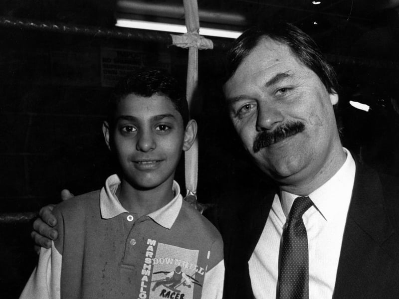 A young Naseem Hamed with his sponsor Nigel Burrows at the Newman Road boxing gym.