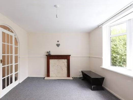 This living room is found to the rear. (Photo courtesy of Purplebricks)