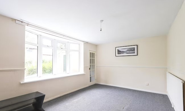 The living room has a large window, which makes the room very bright. (Photo courtesy of Purplebricks)