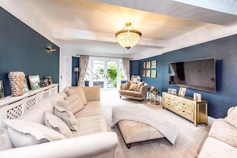 The lounge is bright and spacious and benefits from a unique feature... (Photo courtesy of Zoopla)