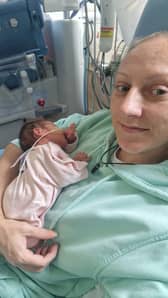 Amy McMillan, 36, with her two-week-old newborn