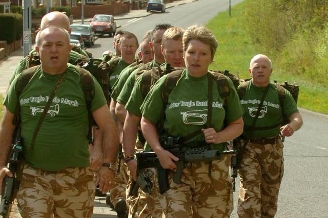 The Route March underway in Ferryboat Lane, led by Paul Jasper and Janice Murray in 2010.