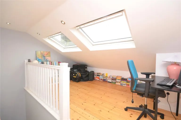 The second floor loft with Velux windows offering a useful work and study space.