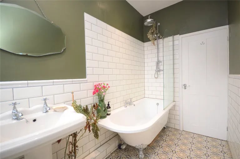 The house bathroom is fitted with a three piece Victorian style suite.