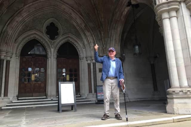 Stanley Luckhurst on the steps of the Royal Courts of Justice celebrating his win against Excel Parking. 
