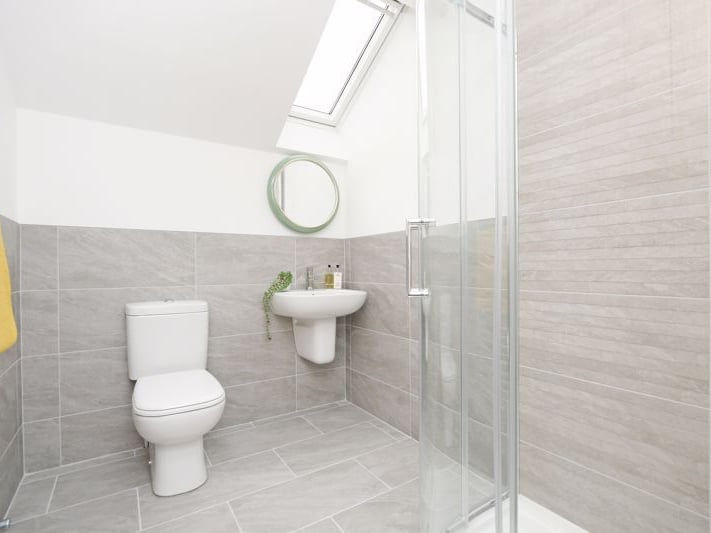 Another of the three bathrooms at the five-bedroom house on Linley Bank Close, in Woodhouse, Sheffield