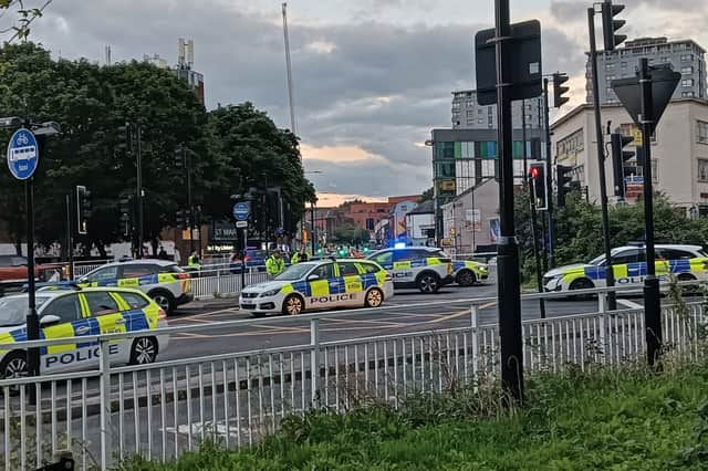 Emergency services at the scene of a crash at St Mary's Gate in Sheffield. Yorkshire Ambulance Service said it was called to reports of a collision involving a car and a motorbike, and one person had been taken to hospital