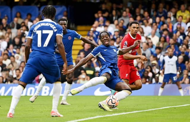 Axel Disasi of Chelsea scores the team’s first goal during the Premier League match between Chelsea FC and Liverpool  (Photo by Shaun Botterill/Getty Images)