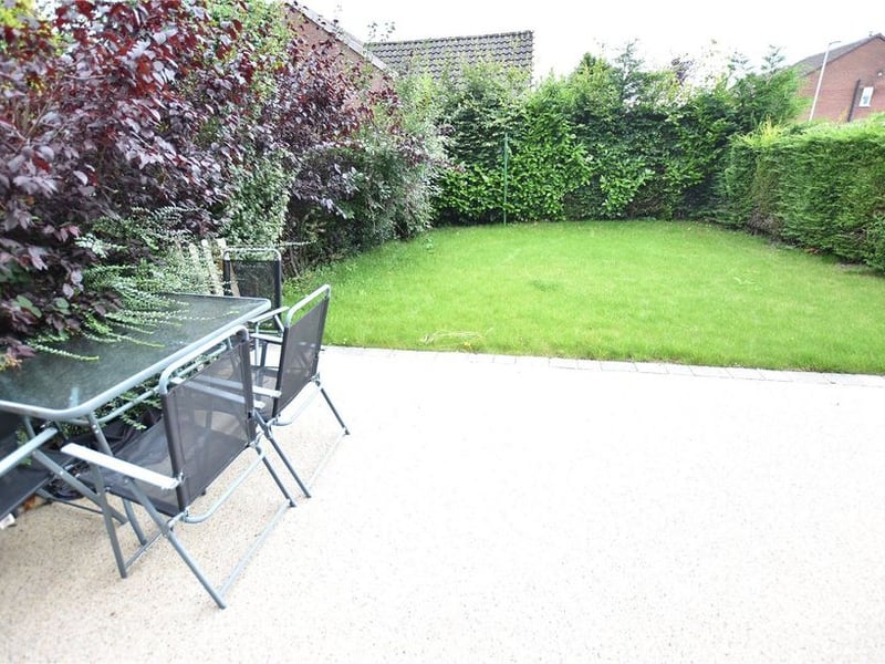To the rear is a good sized patio.
