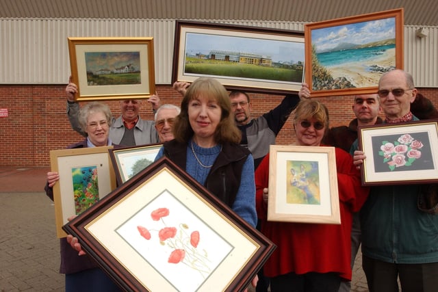 Linda Storey and fellow artists were taking part in a sale of original art in 2003, and were pictured at C&M Framing.