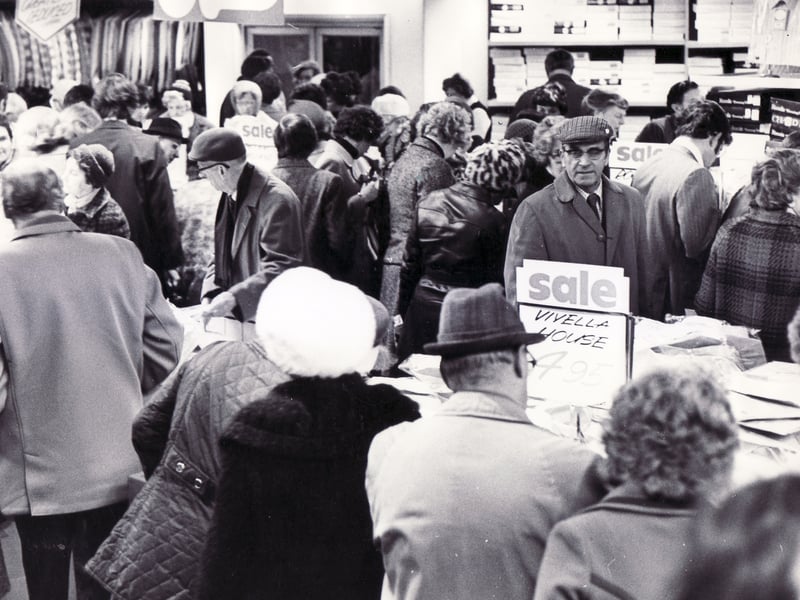 The gents department at Walsh's department store, on High Street, Sheffield, in January 1976, during the new year sales. 