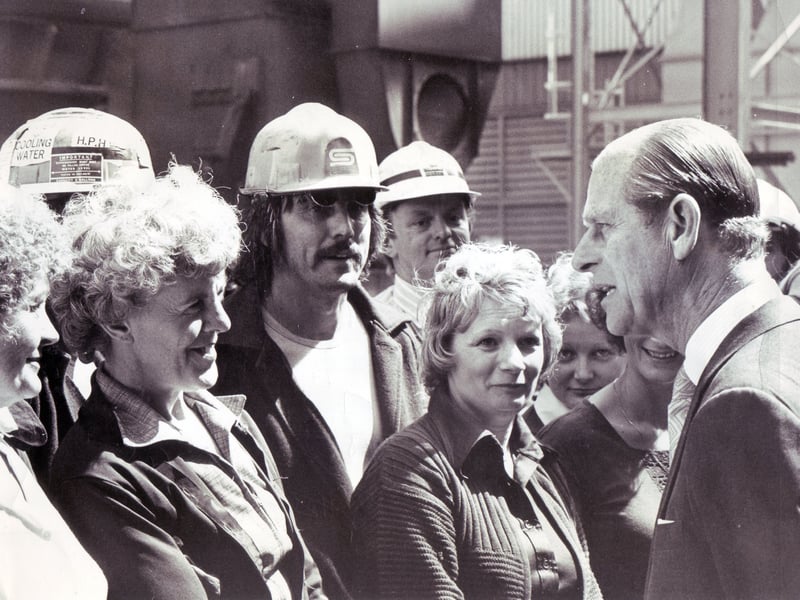 The Duke of Edinburgh chats to workers on a visit to the new BSC Stainless Works in Sheffield in July 1978