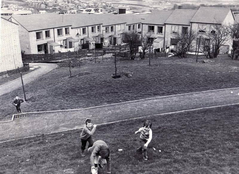 Youngsters playing in the Westfield Township, Mosborough, Sheffield, in February 1976