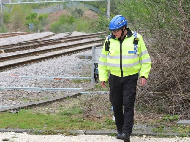 Trams were delayed after a police  incident at Woodhouse Station, Sheffield. File picture shows a British Transport Police Officer next to railway lines in Sheffield. Picture: Dean Atkins, National World