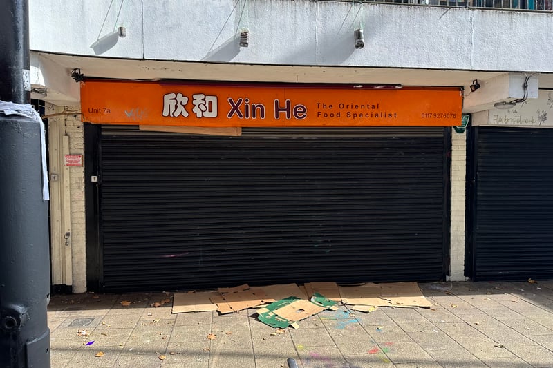 Cardboard has been spread out the front of the former Xin He Oriental Food Specialist on the lower level of Haymarket Walk