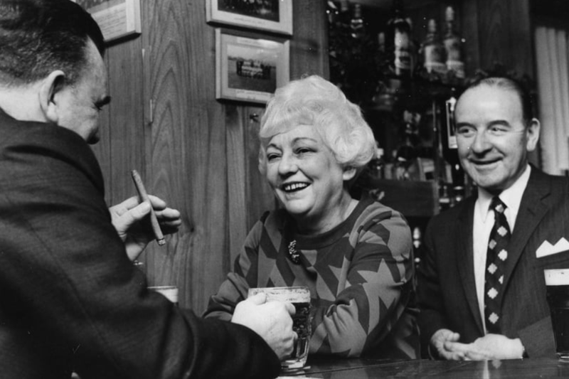 Edith Coulson, manageress of Albermale public house chatting to customers in January 1971. Photo: Shields Gazette