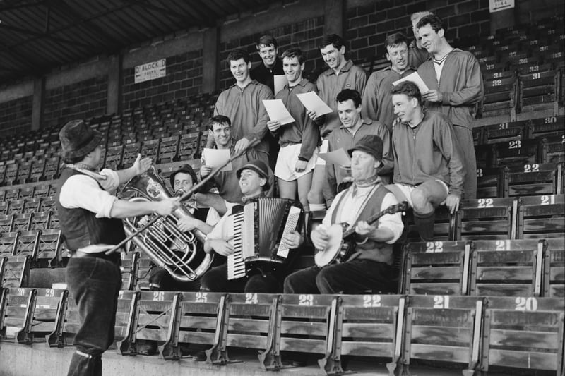Bristol City FC players rehearsing club song with Wurzles frontman singer Adge Cutler on 16th February 1967.  In 1977, the Somerset band’s homage to the club led to One For The Bristol City becoming City’s official anthem.