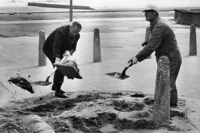 Council workmen in South Shields were shovelling sand from the road back onto the beach in this June 1981 photo. Photo: Shields Gazette
