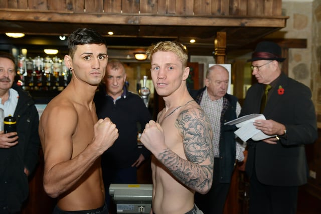 Boxers Paul Truscott (left) and Kirk Goodings at their weigh-in at The Cavalier pub in 2013.