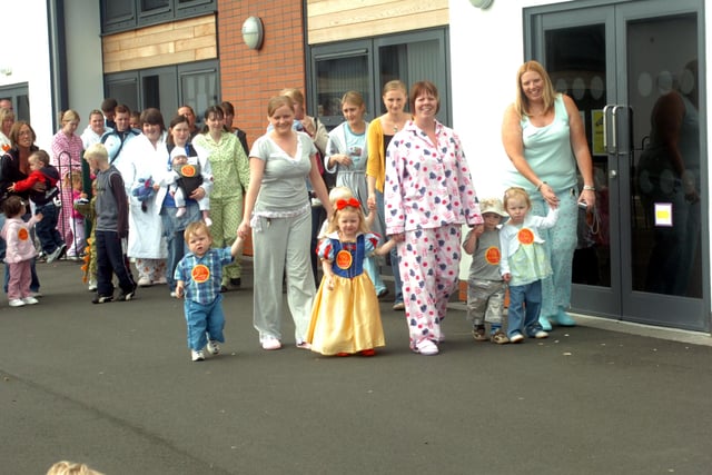 It's a 2007 scene and it shows children from the Little Bundles Nursery on their sponsored toddle.