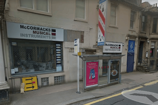 McCormack’s Music Store was a legendary Glasgow institution until it closed its doors in 2011. The Rolling Stones were booked to officially re-open the shop which had relocated from Cowcaddens to Bath Street. Huge crowds turned up, so much so that the shop had to be closed in fear of a crush. 