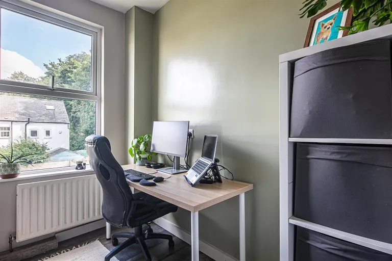 Currently, only one bedroom is required, meaning the other can show its versatility as a home office. (Photo courtesy of Zoopla)
