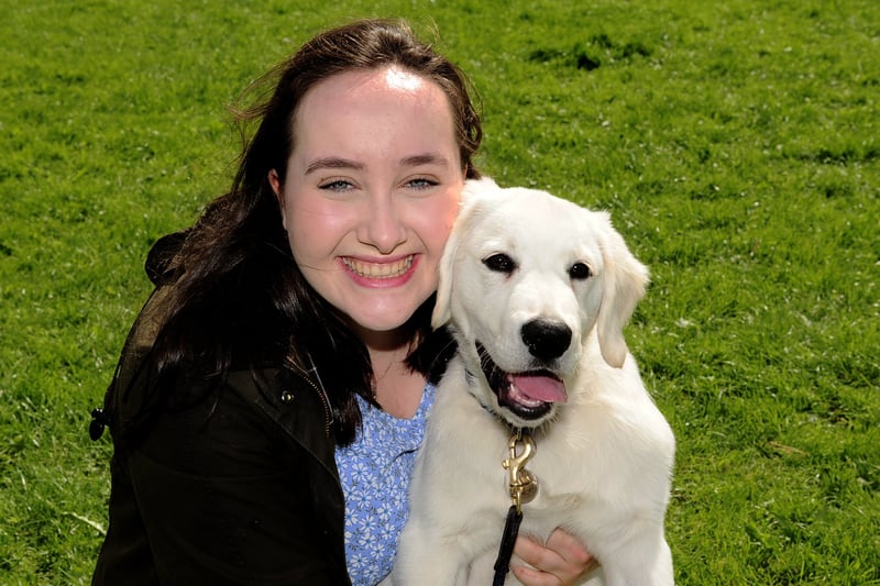 Sophie Bennett with golden retriever Colin who won best puppy.
