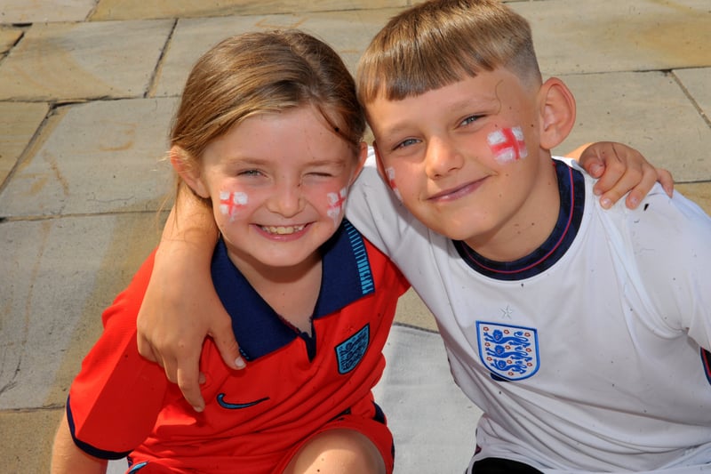 Brother and sister Lilly Young , nine and Phillip, 11 of Beeston supported the Lionesses at Millennium Square.