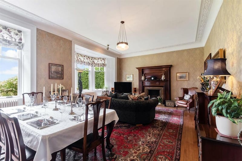 The dining room/sitting room’s dimensions are generous at over 24 feet, with bay window too!