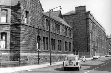A view along Chancellor Street in Partick with St Peter’s chapel house and St Peter’s primary school in the image. 
