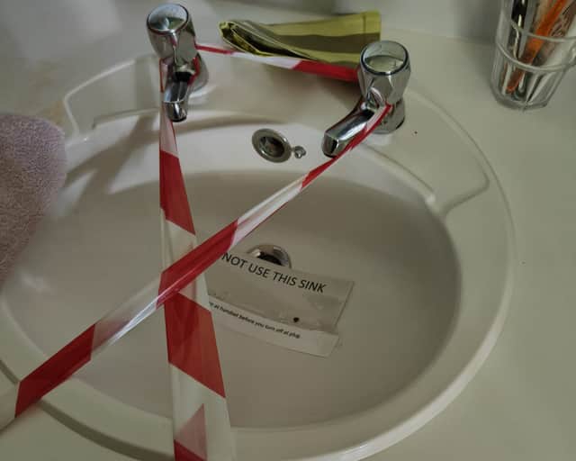 Sinks in the Woodland View dementia unit have been marked as "do not use" due to risks posed by Legionella.