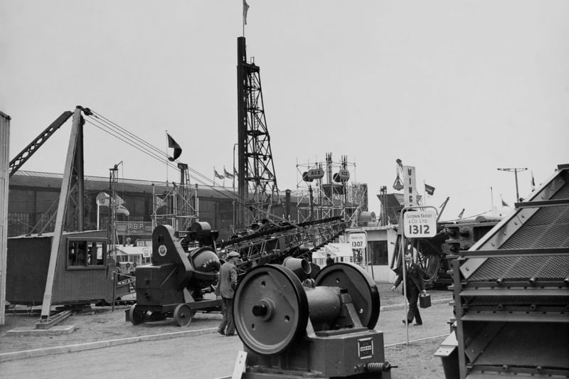 Heavy engineering exhibits too large for the covered exhibition of the British Industries Fair in Castle Bromwich, Birmingham, 9th May 1950. The exhbition’s tallest exhibit is visible in the background. (Photo by E. Round/Fox Photos/Hulton Archive/Getty Images)