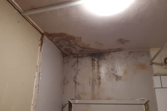 Floor-to-ceiling black mould in the bathroom has been causing the family health, social and emotional issues.