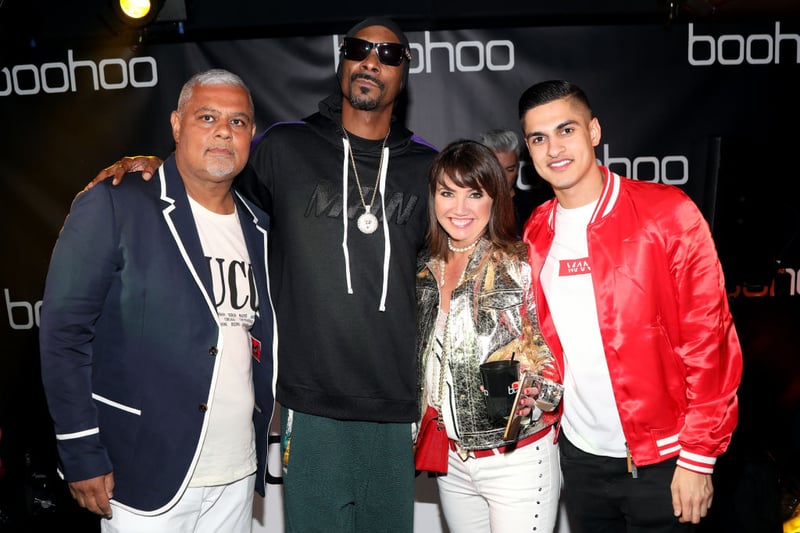 Mahmud Kamani, pictured here on the far left next to Snoop Dog, is the founder of the online fast fashion retailer Boohoo. He is the 16th richest person in the North West, according to Insider, with a net worth of £660m. 