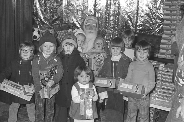  Some of the children of the ACROW Group employees who received presents from Santa Claus at the annual party in Steels' Social Club, in 1976.