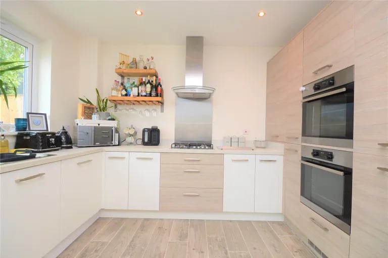 Modern wall and base units are fitted.