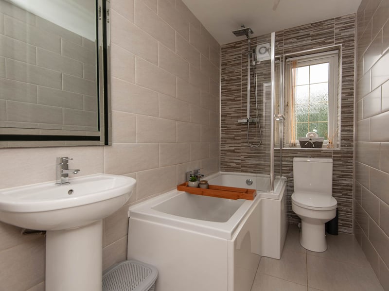 The family bathroom also benefits from the modern appearance. (Photo courtesy of Redbrik)