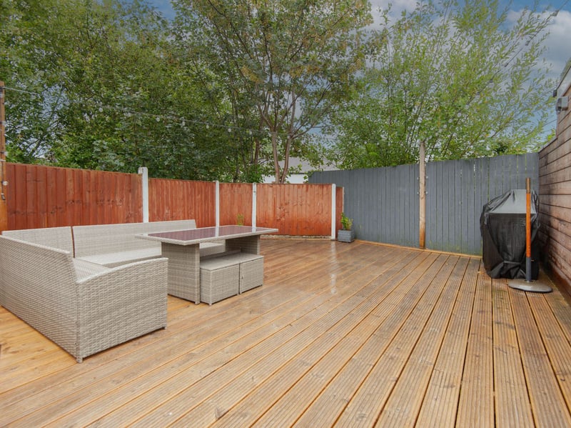As well as the lawn area, this garden has a slightly raised patio area. (Photo courtesy of Redbrik)