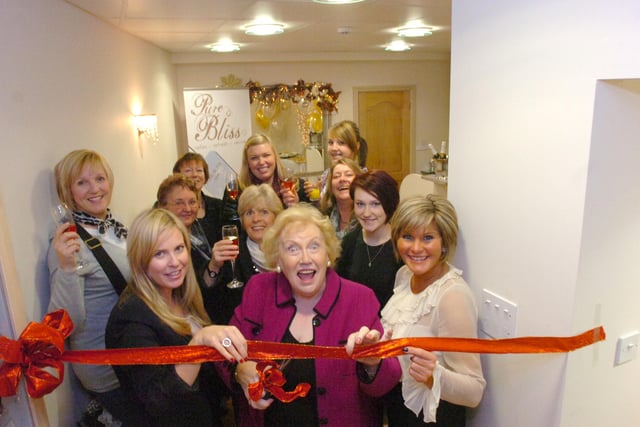 Agony aunt Denise Robertson cut the ribbon to officially open the extension to Pure Bliss in Sea Road in 2009.
Here she is with manager Lisa Seferi (front left) and Carol Stametti (front right) and some of the customers.